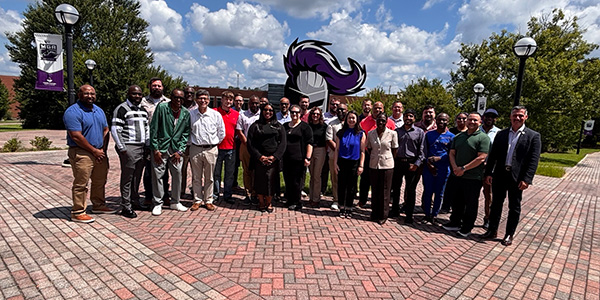Group image of the DSIT Cohort and professors.